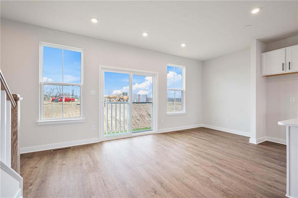 108 Scenic Ridge Drive Venetia, PA 15367 - Photo 19 of 32 a view of an empty room with wooden floor and a window
