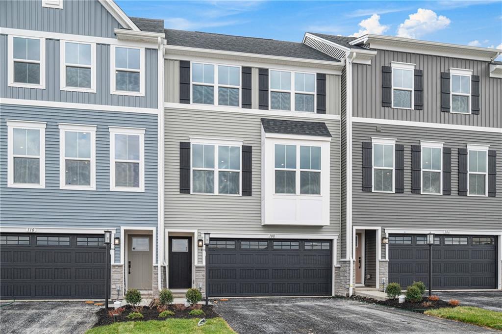 108 Scenic Ridge Drive Venetia, PA 15367 - Photo 2 of 32 a front view of a building with street