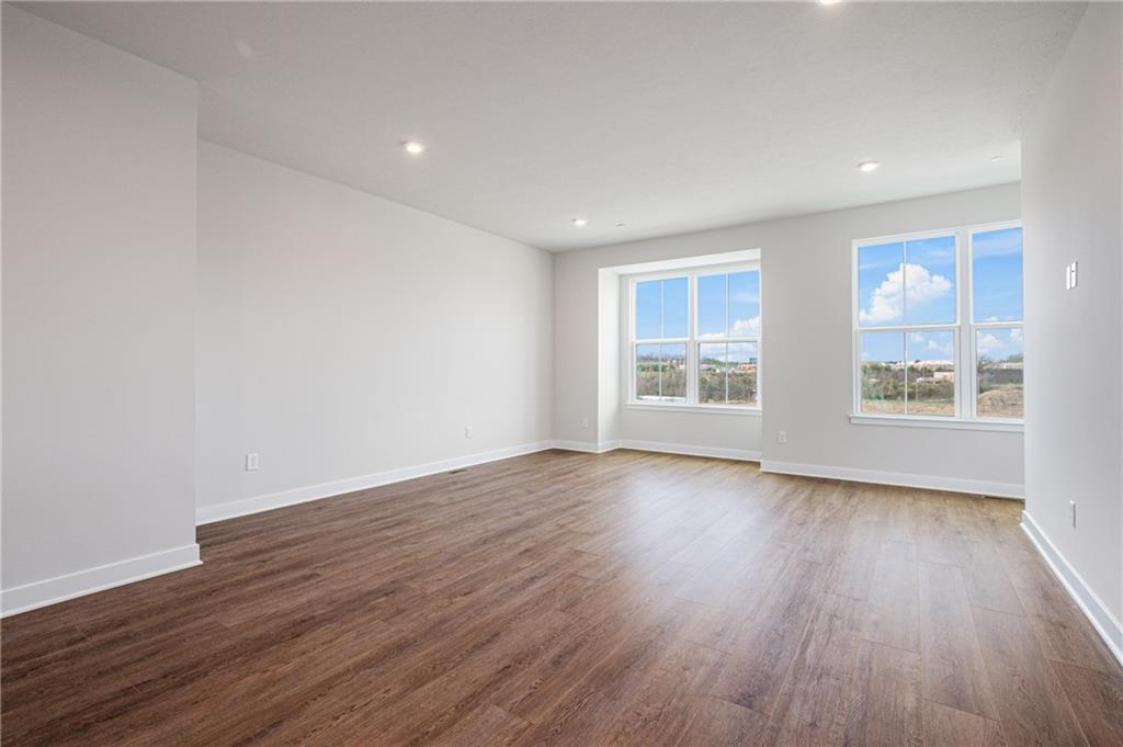 108 Scenic Ridge Drive Venetia, PA 15367 - Photo 9 of 32 a view of an empty room with wooden floor and a window