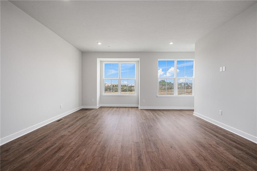 108 Scenic Ridge Drive Venetia, PA 15367 - Photo 10 of 32 wooden floor in an empty room with a window
