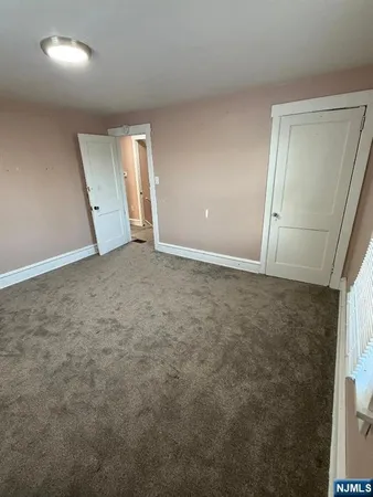 a bathroom with a sink vanity and mirror