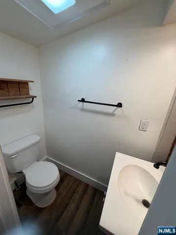 a large kitchen with stainless steel appliances kitchen island granite countertop a large counter top and stove