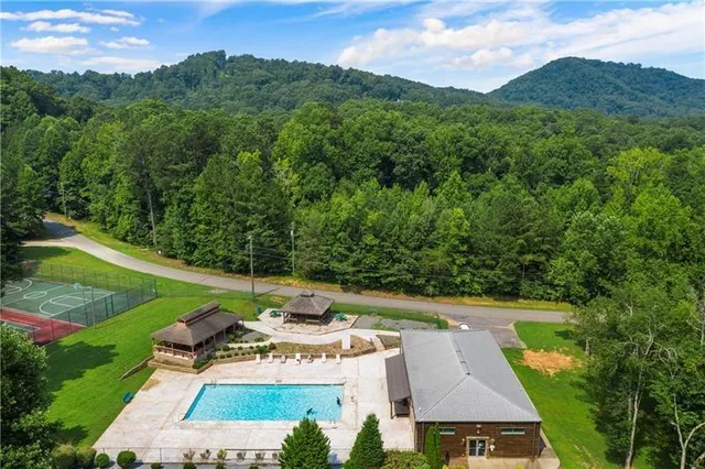 a view of a table and chairs in the garden