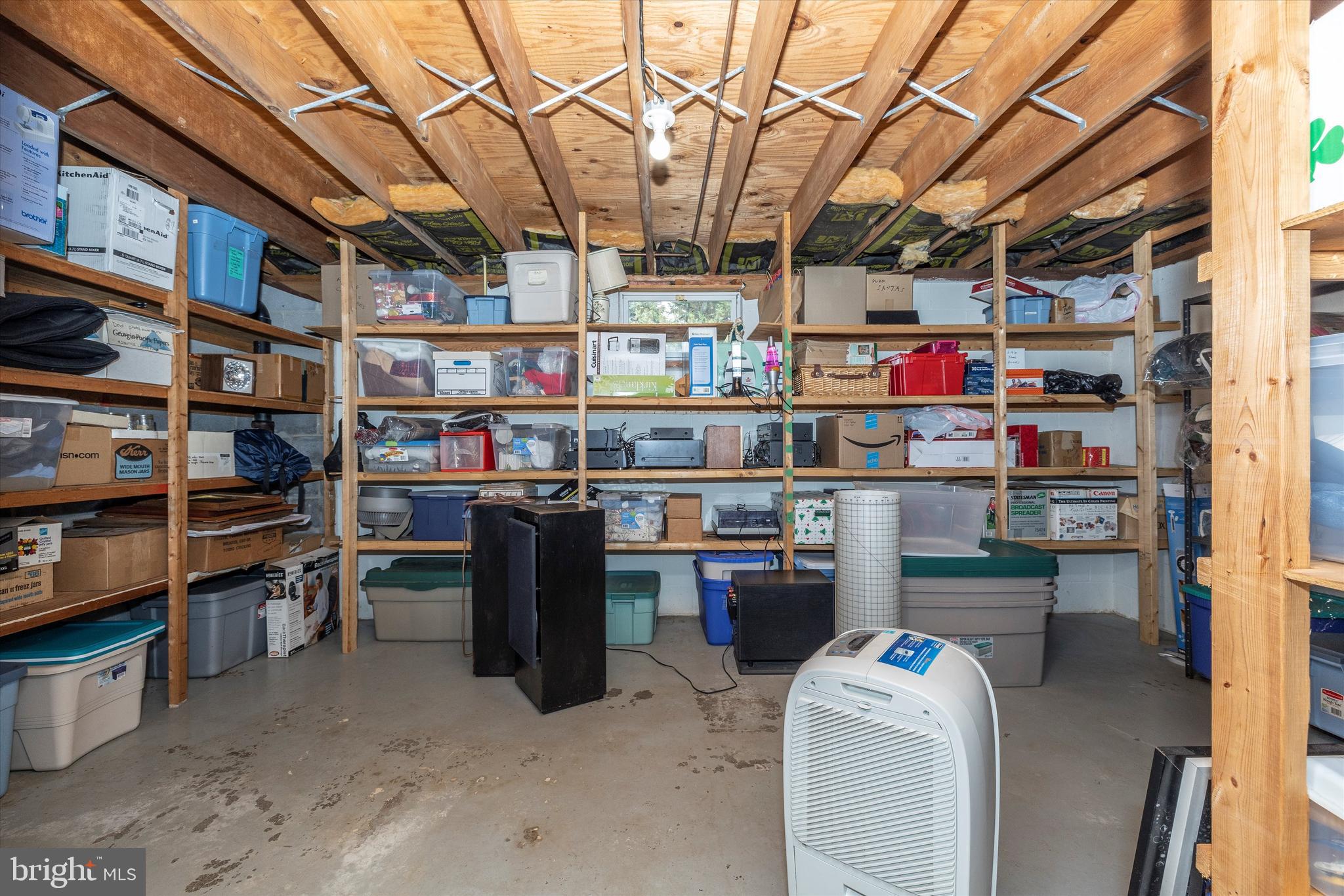 11057 Bennie Duncan Road Frederick, MD 21701 - Photo 46 of 89 Large storage area with built in shelves