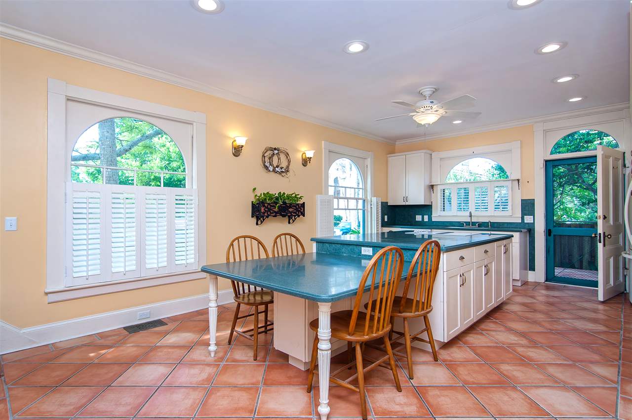 39 Valencia Street St. Augustine, FL 32084 - Photo 15 of 50 a dining room with furniture and a large window