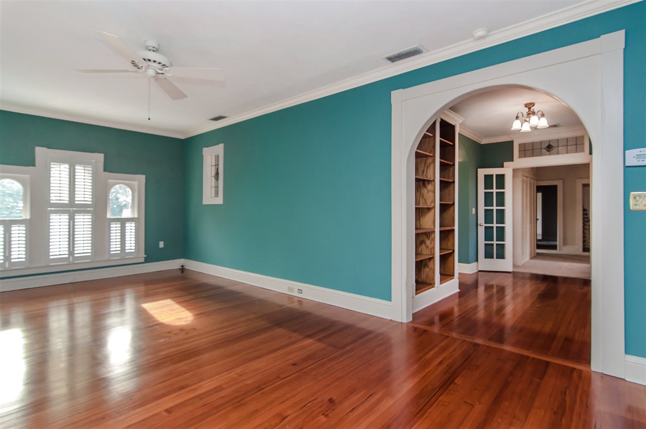 39 Valencia Street St. Augustine, FL 32084 - Photo 4 of 50 a view of a livingroom with wooden floor and a ceiling fan