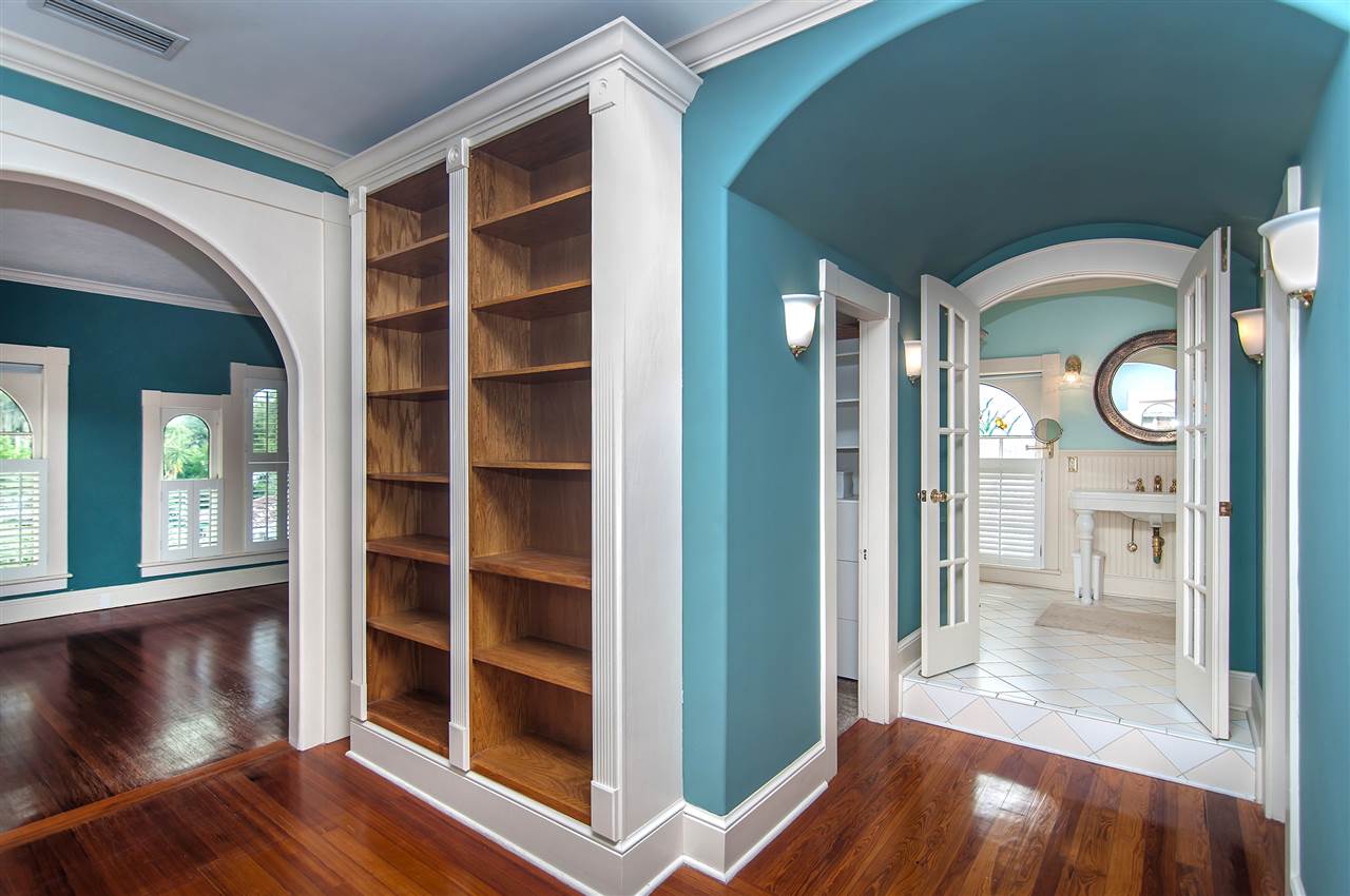 39 Valencia Street St. Augustine, FL 32084 - Photo 33 of 50 a view of a hallway with wooden floor and windows