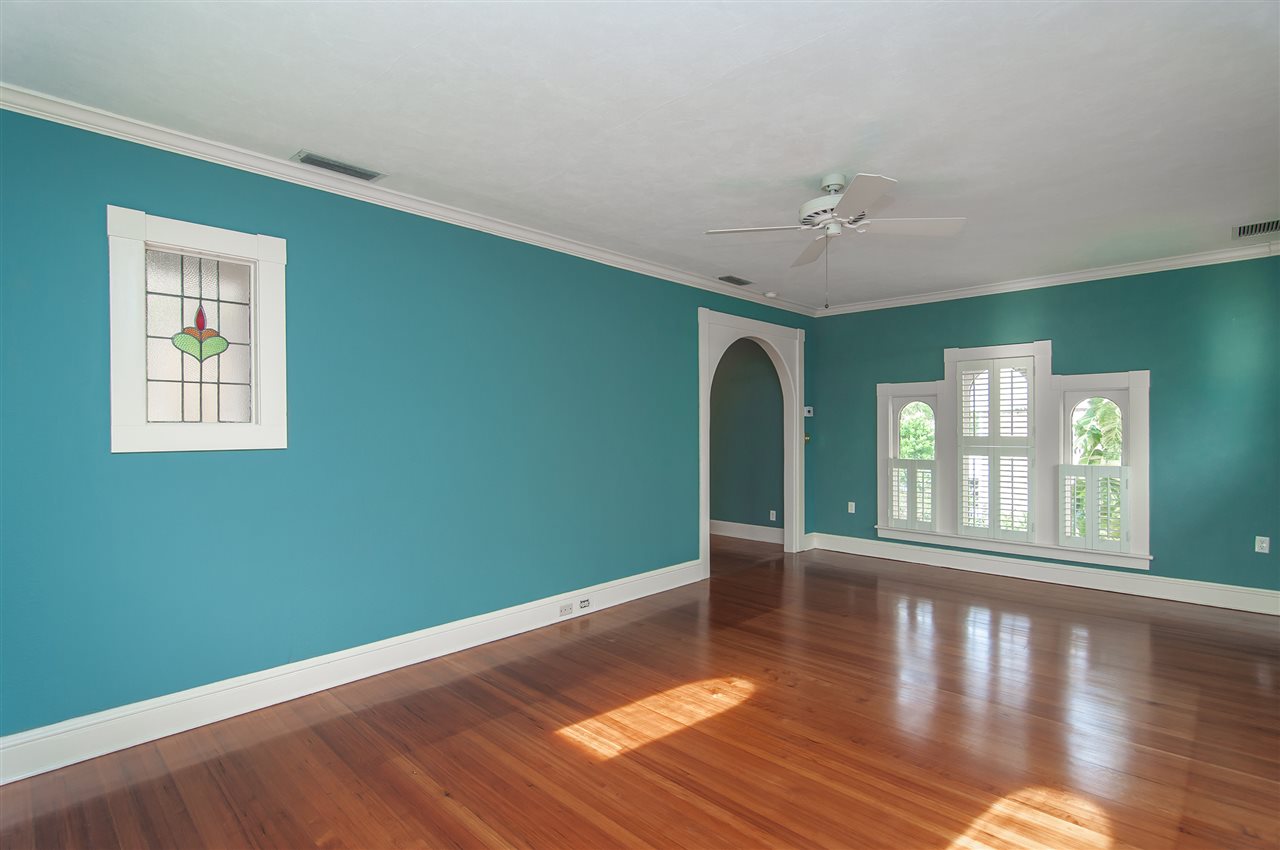 39 Valencia Street St. Augustine, FL 32084 - Photo 41 of 50 a view of an empty room with window and wooden floor