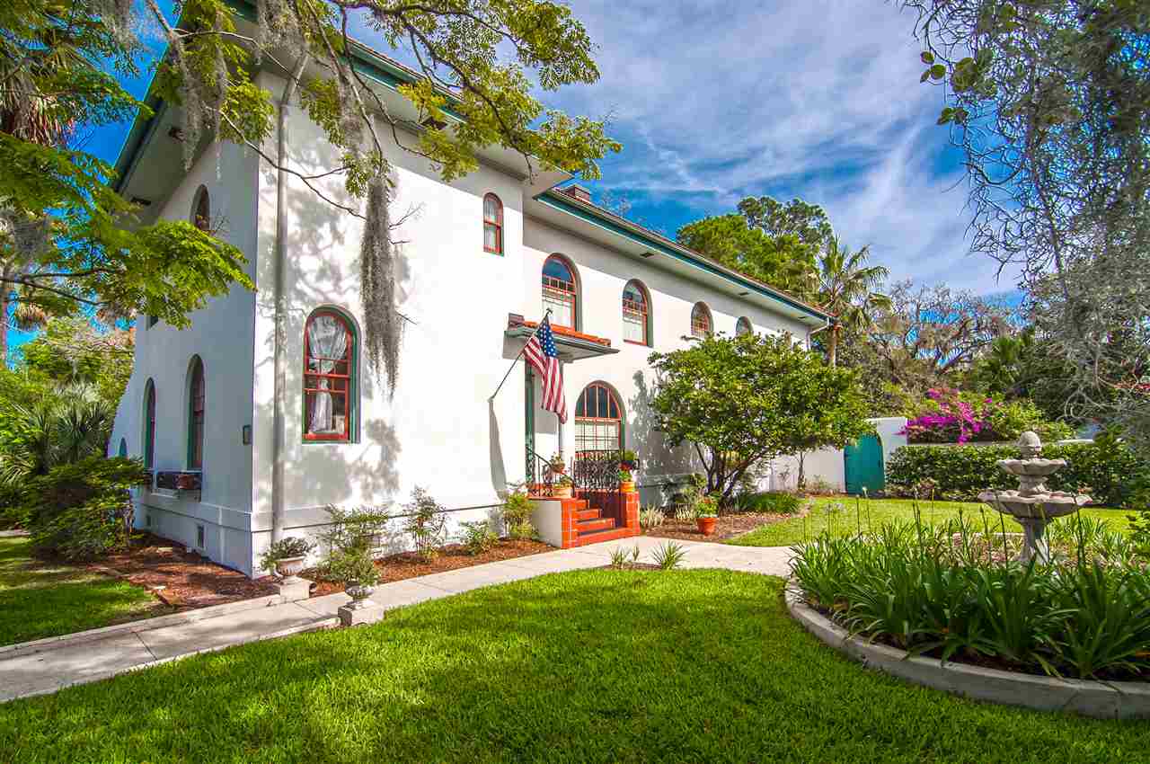 39 Valencia Street St. Augustine, FL 32084 - Photo 48 of 50 a front view of a house with a yard