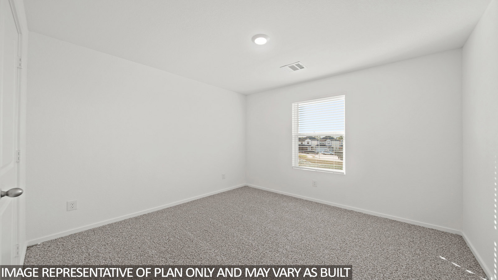228 Flying Tigers Trail Jarrell, TX 76537 - Photo 13 of 17 Bright room featuring neutral-toned carpet and white walls