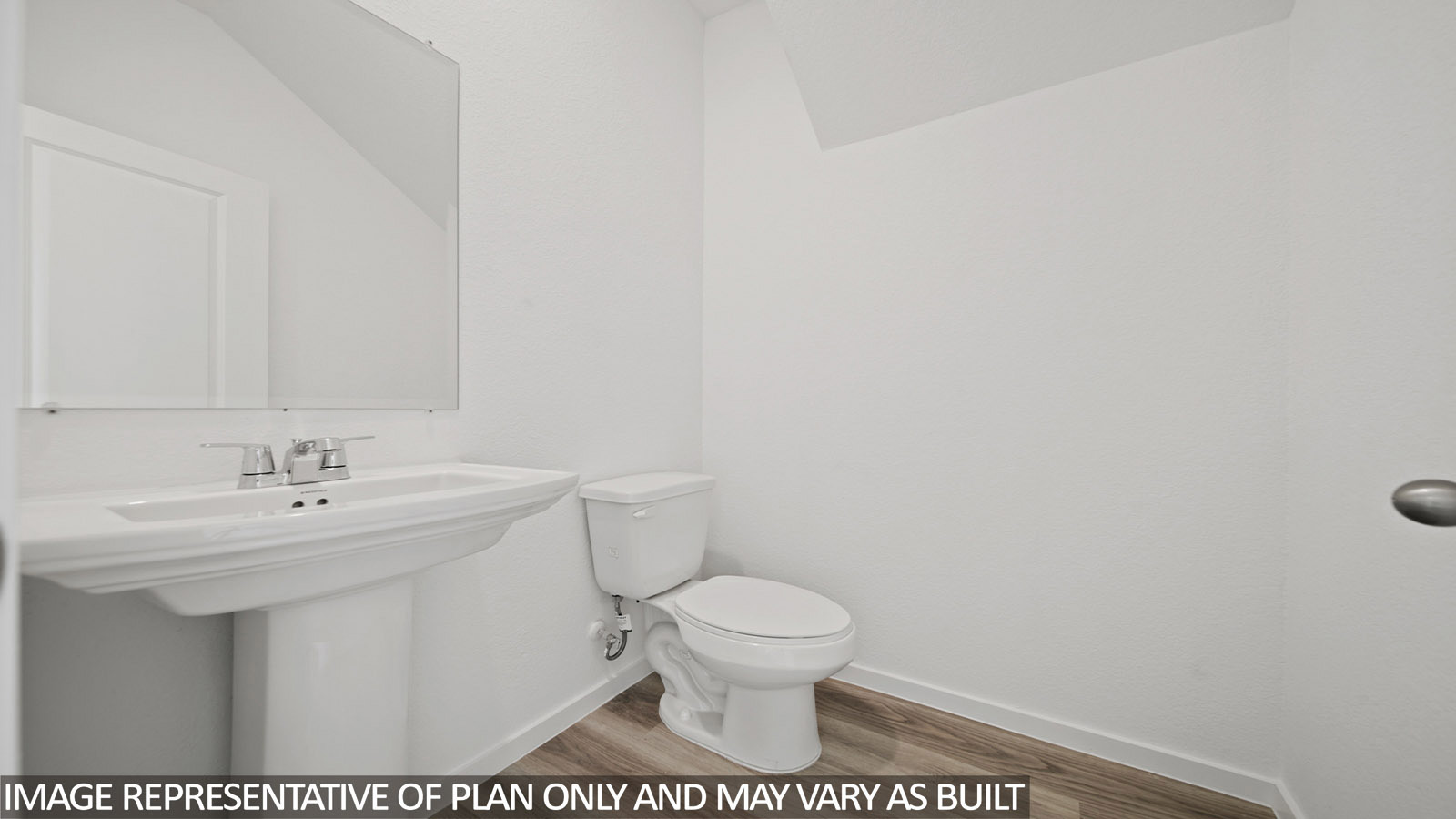 228 Flying Tigers Trail Jarrell, TX 76537 - Photo 16 of 17 Pedestal sink with chrome faucet and rectangular mirror