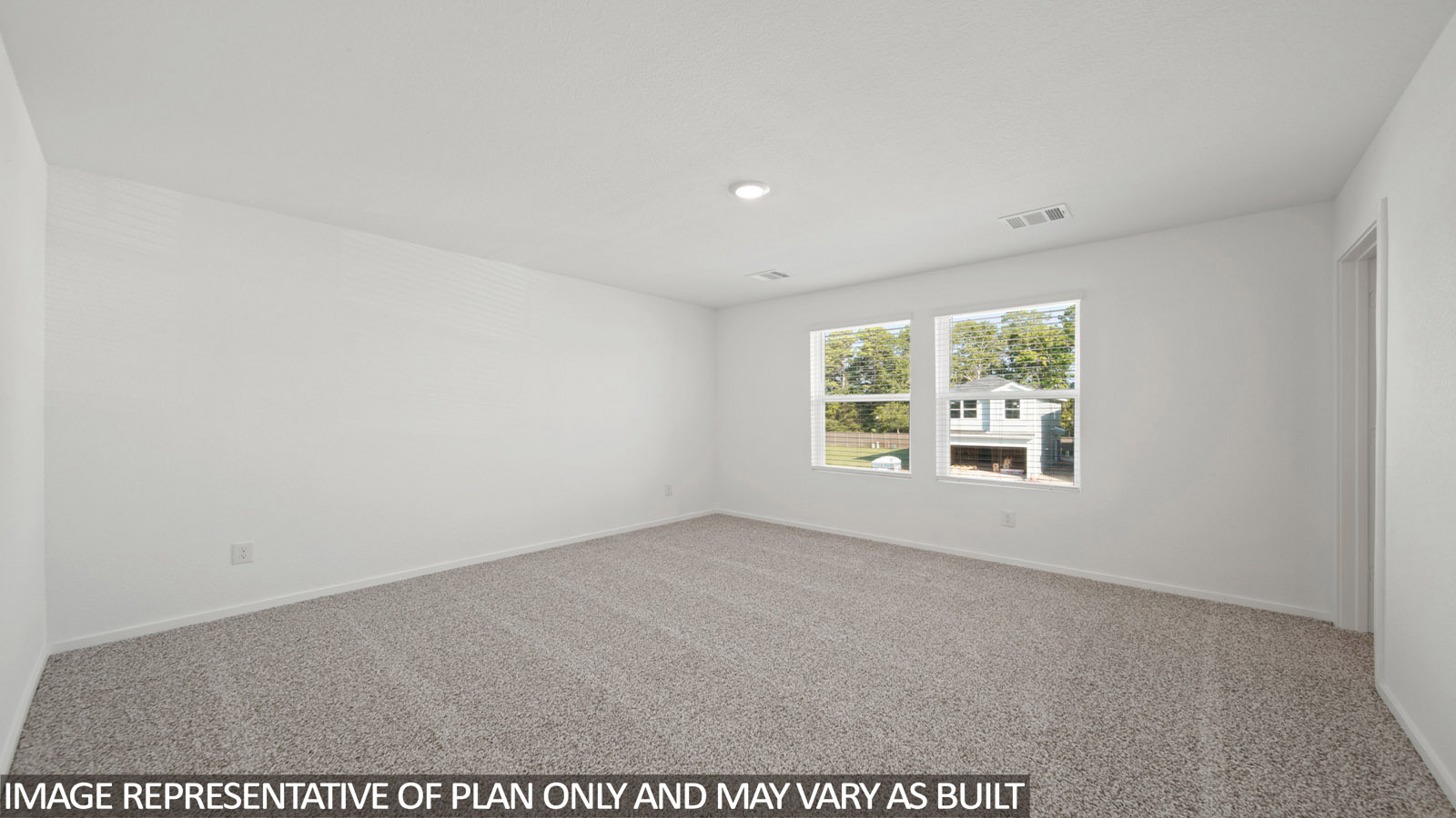 228 Flying Tigers Trail Jarrell, TX 76537 - Photo 9 of 17 Spacious room featuring neutral carpet flooring, white walls, and two large windows providing natural illumination
