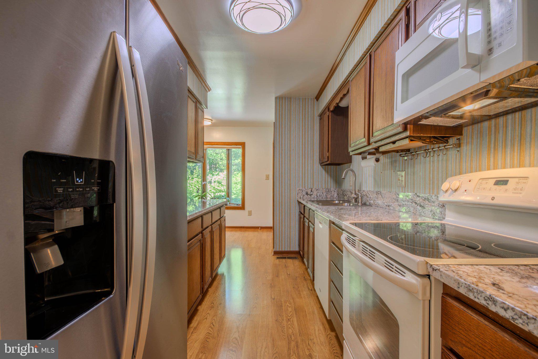 31749 Morris Leonard Road Parsonsburg, MD 21849 - Photo 11 of 40 Modern kitchen with sleek finishes.