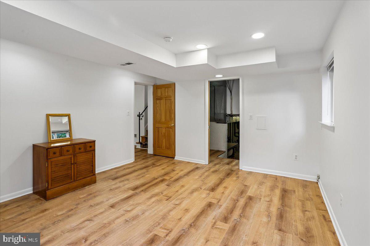 1703 Tilton Drive Silver Spring, MD 20902 - Photo 26 of 39 Spacious, bright room with warm tones.