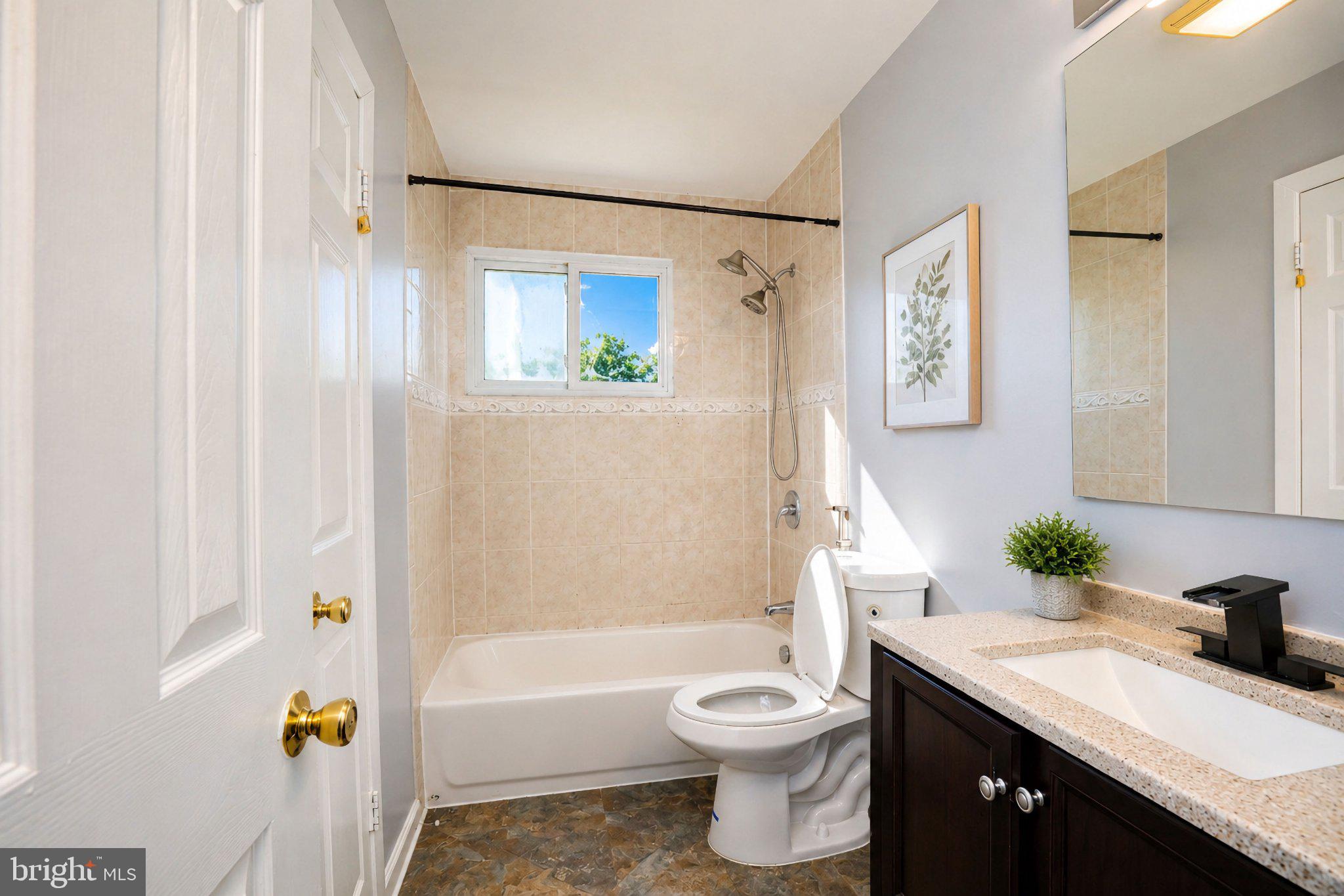 5712 Ash Drive Springfield, VA 22150 - Photo 13 of 38 Bright and inviting bathroom retreat.