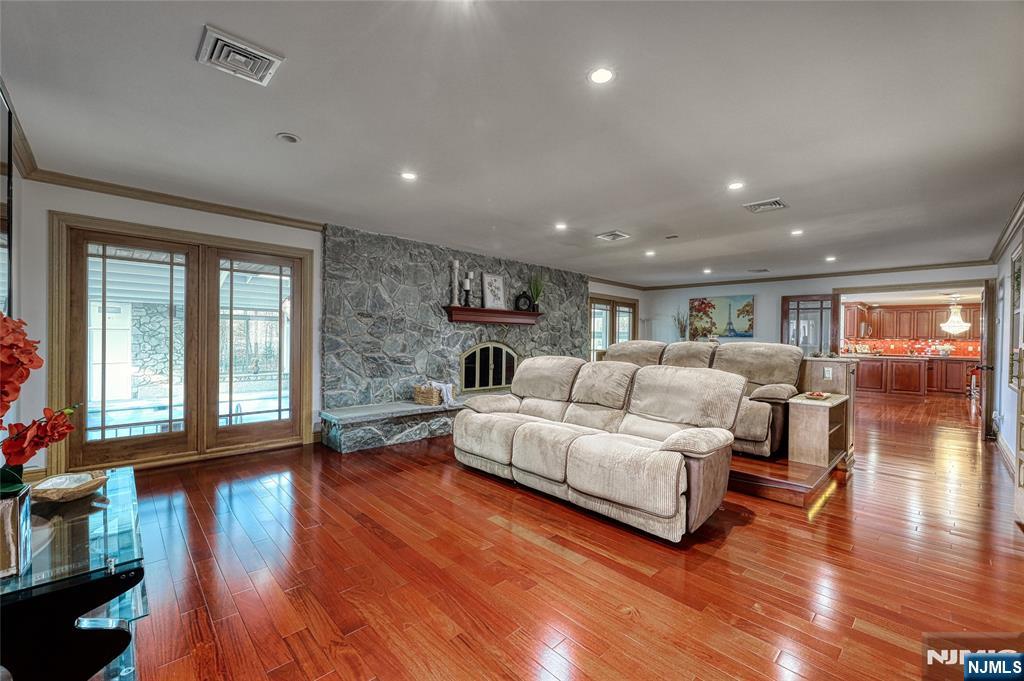 91 Chestnut Ridge Road Saddle River, NJ 07458 - Photo 16 of 41 a living room with furniture and a wooden floor
