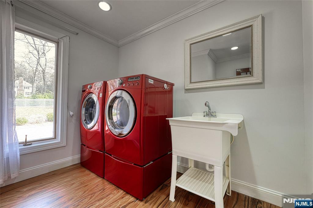 91 Chestnut Ridge Road Saddle River, NJ 07458 - Photo 23 of 41 a utility room with dryer and washer