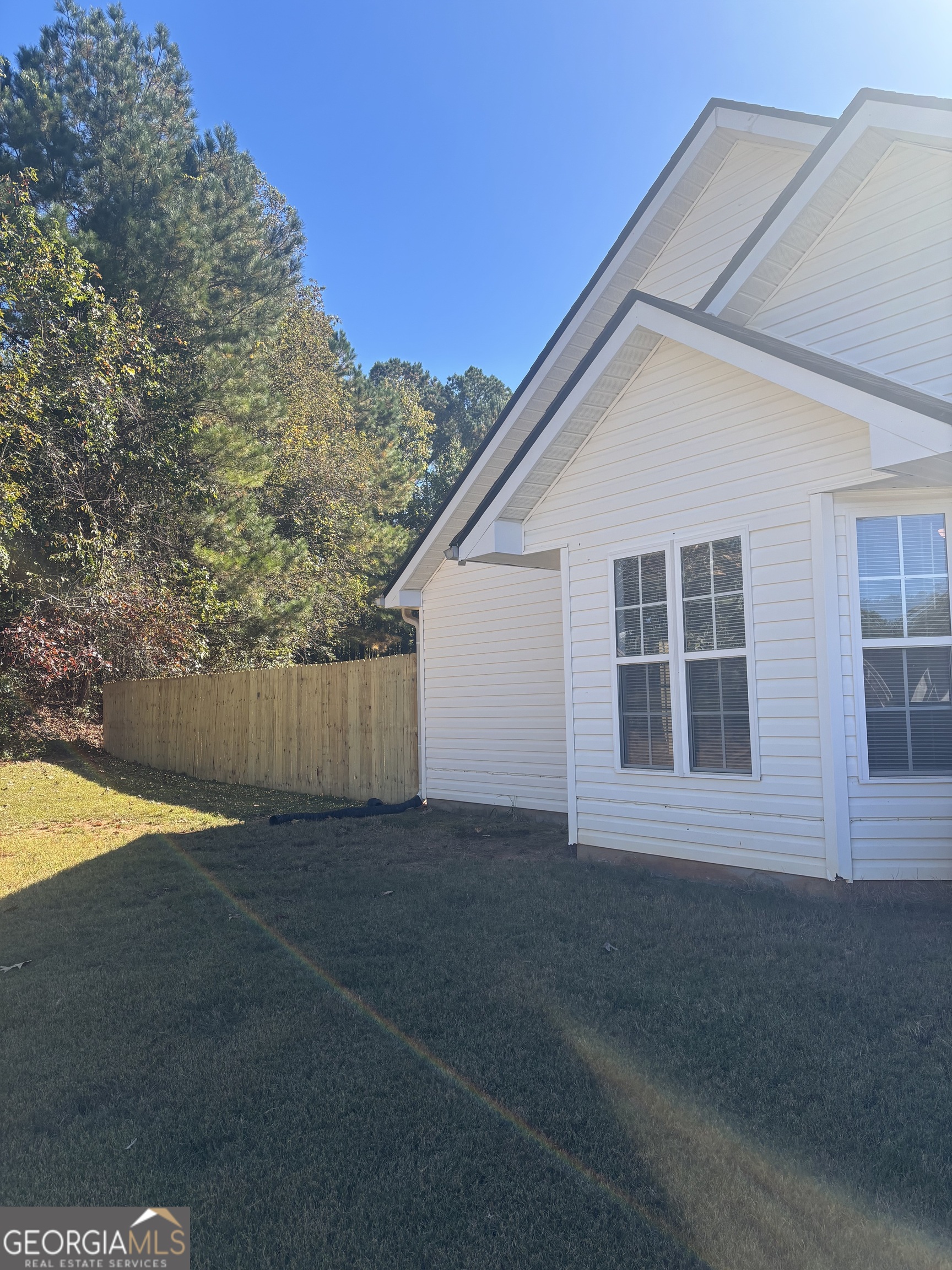 15 Tabitha Court Covington, GA 30016 - Photo 3 of 10 a view of backyard with large tree