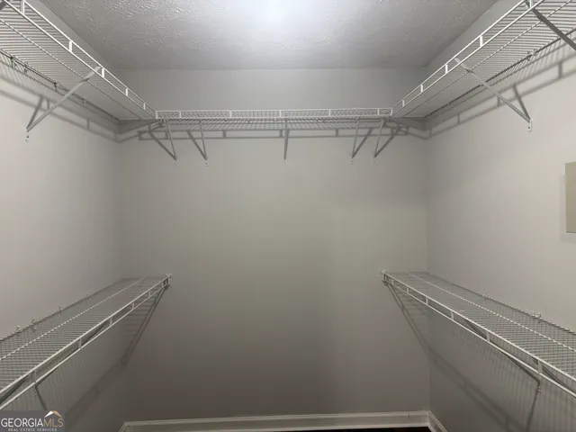 a view of a room with racks on the wall