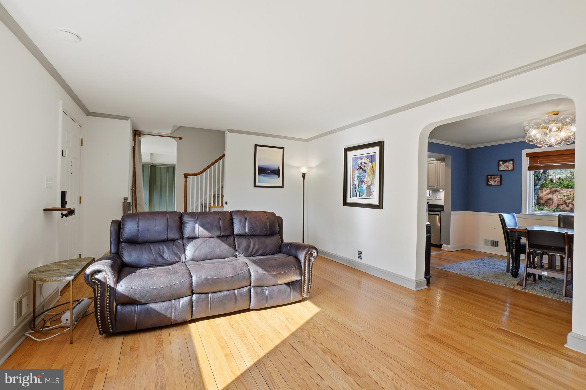 1303 Ballard Street Silver Spring, MD 20910 - Photo 12 of 53 a living room with furniture and a wooden floor