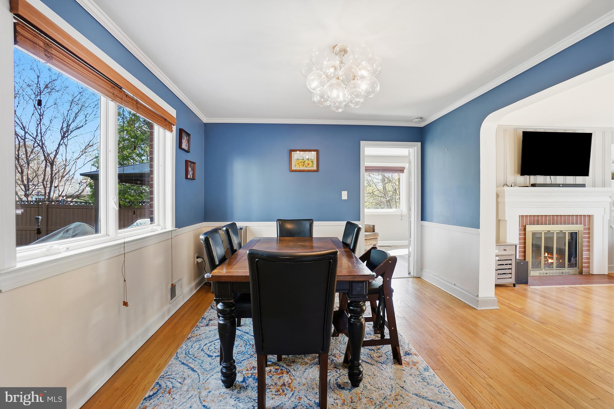 1303 Ballard Street Silver Spring, MD 20910 - Photo 16 of 53 a view of a dining room with furniture window and wooden floor