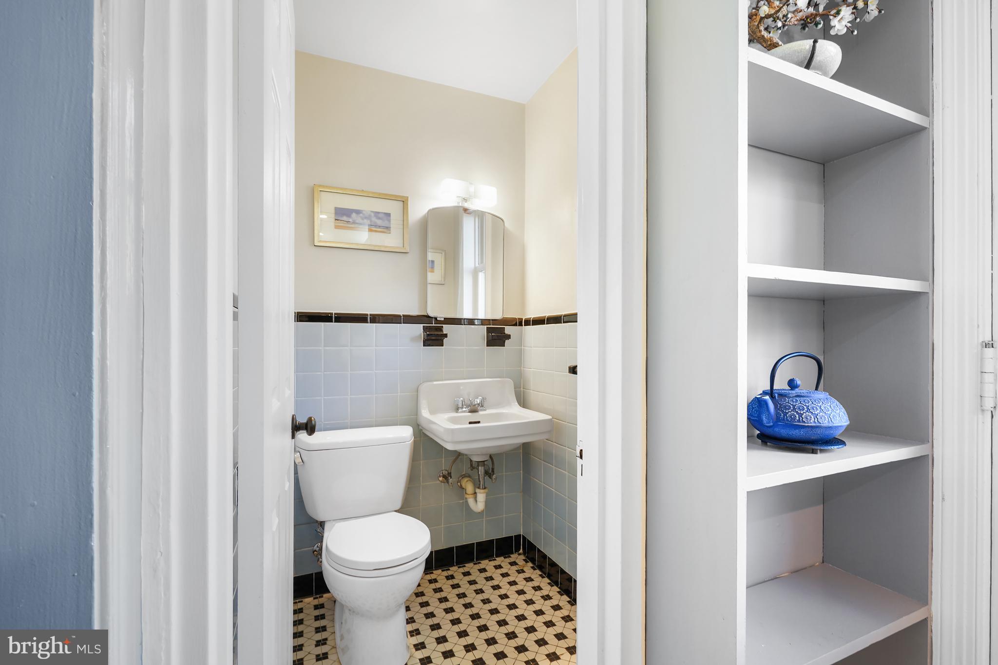 1303 Ballard Street Silver Spring, MD 20910 - Photo 20 of 53 a bathroom with a toilet and a sink