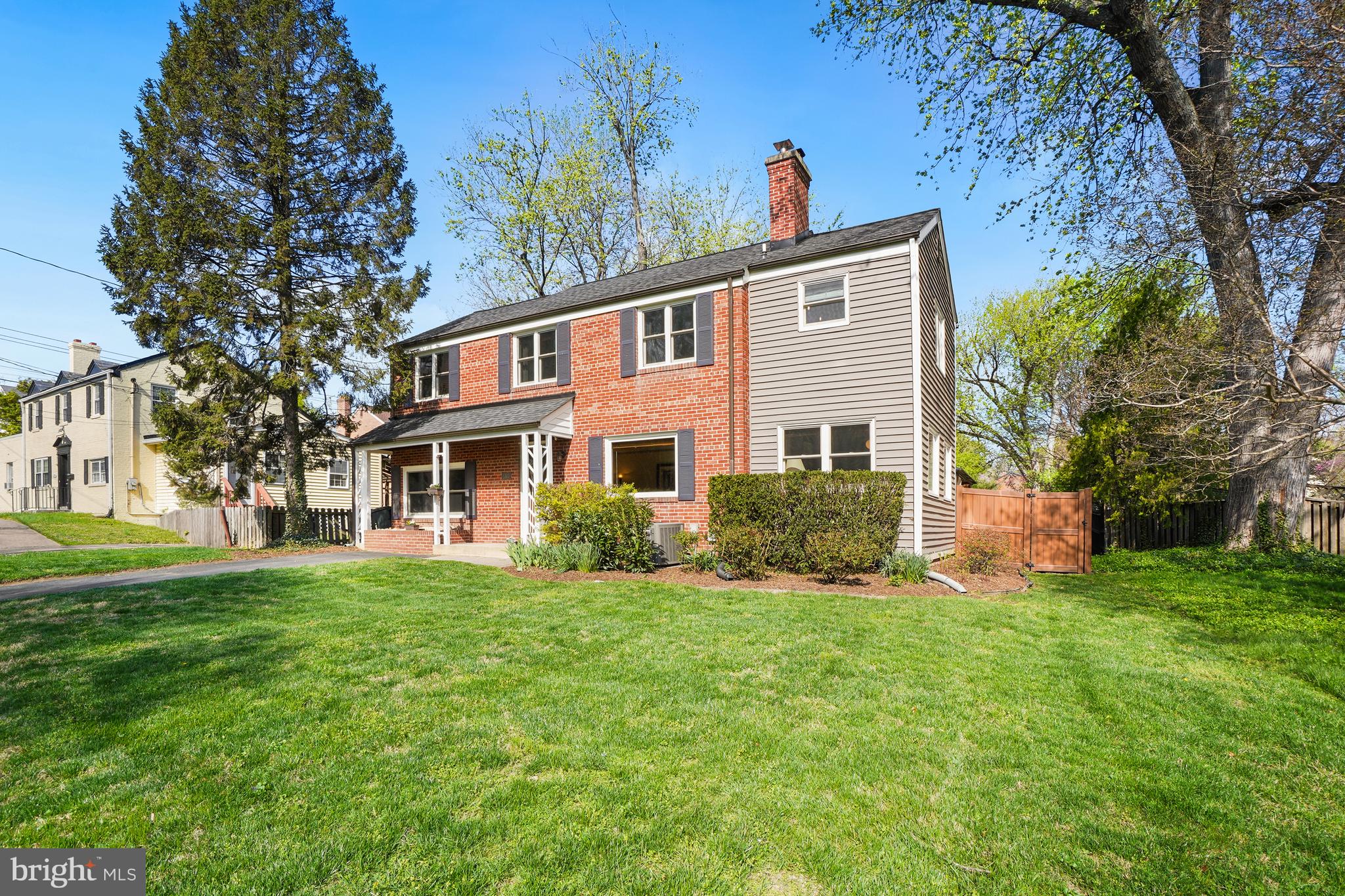 1303 Ballard Street Silver Spring, MD 20910 - Photo 2 of 53 a front view of a house with a yard