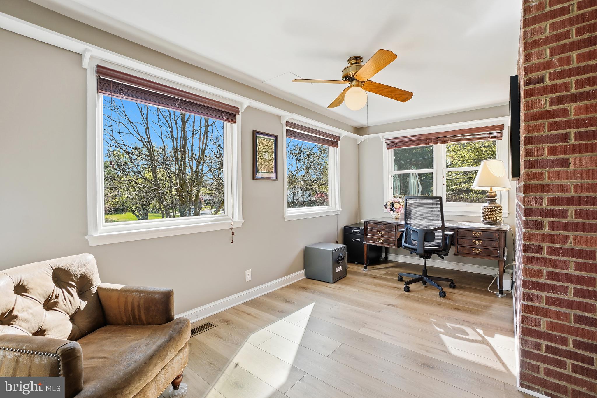 1303 Ballard Street Silver Spring, MD 20910 - Photo 25 of 53 a living room with furniture and a large window
