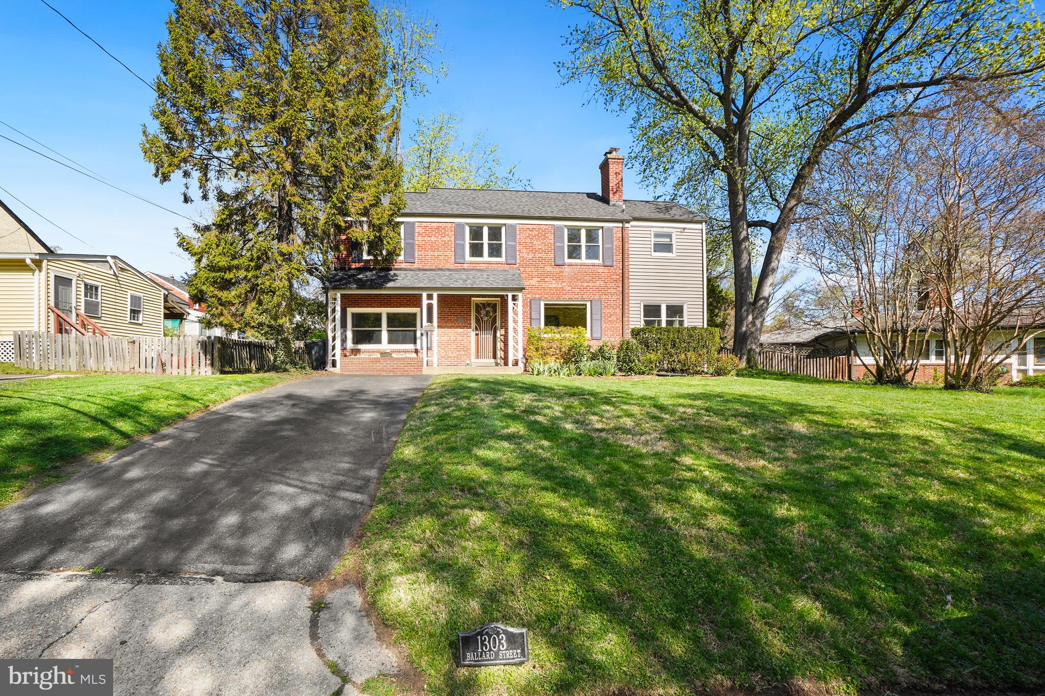 1303 Ballard Street Silver Spring, MD 20910 - Photo 3 of 53 a front view of a house with a garden