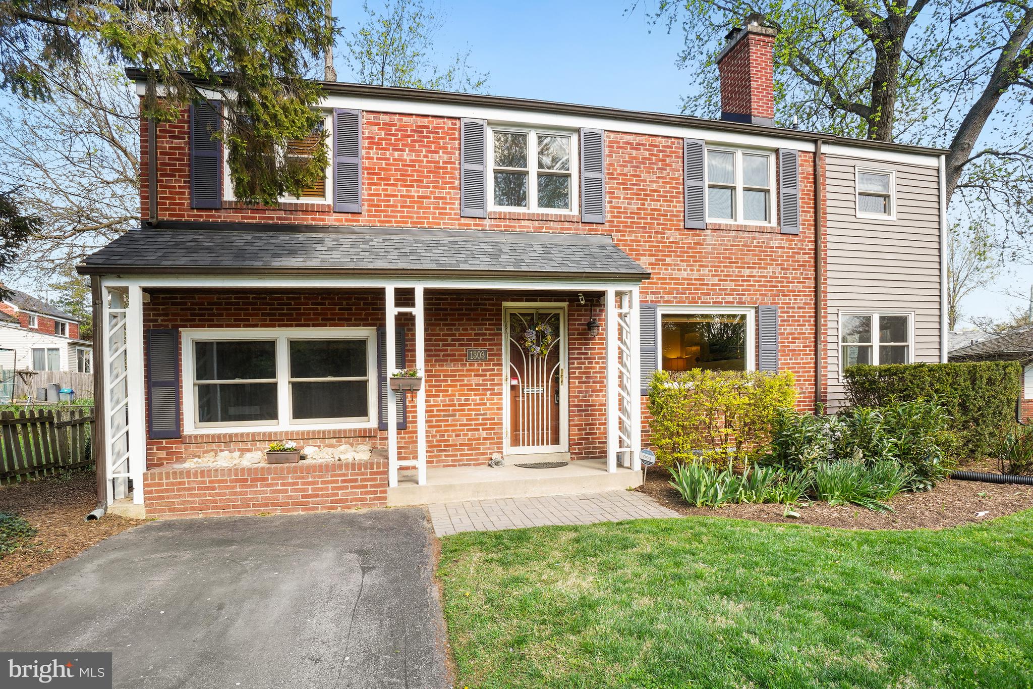 1303 Ballard Street Silver Spring, MD 20910 - Photo 6 of 53 a front view of a house with garden