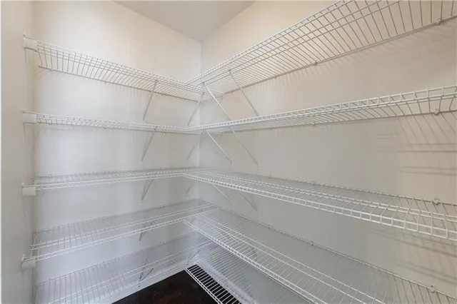 a empty closet with white paint