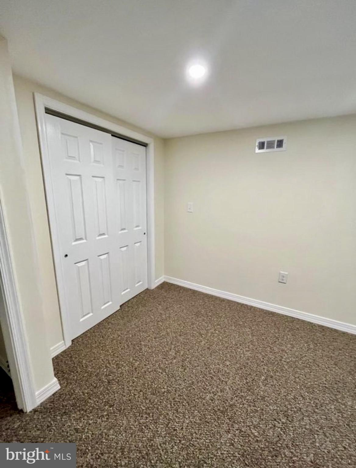 22 Maple Street Conshohocken, PA 19428 - Photo 18 of 22 an empty room with a bench