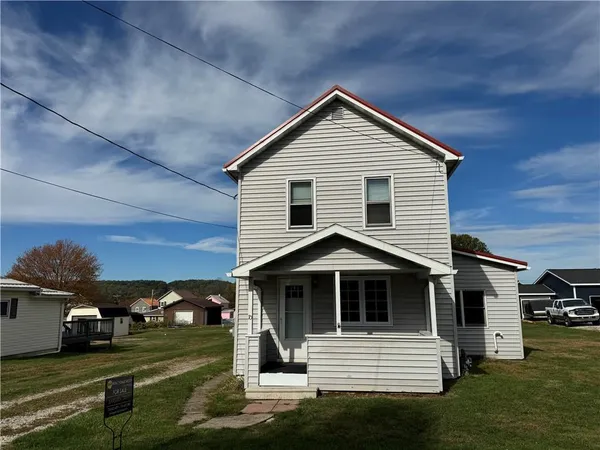 a view of a porch of a house