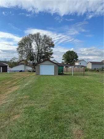 a view of a house with a big yard