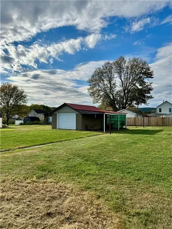 a view of a backyard with a garden