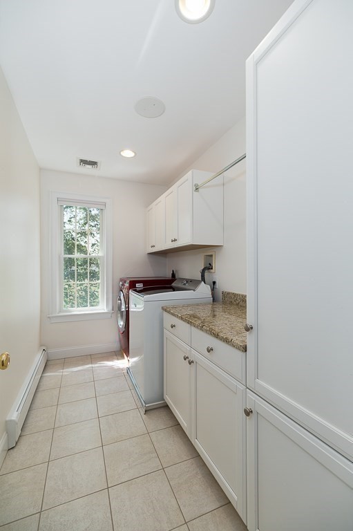 17 Patton Drive Hamilton, MA 01982 - Photo 30 of 37 a kitchen with a sink window and cabinets