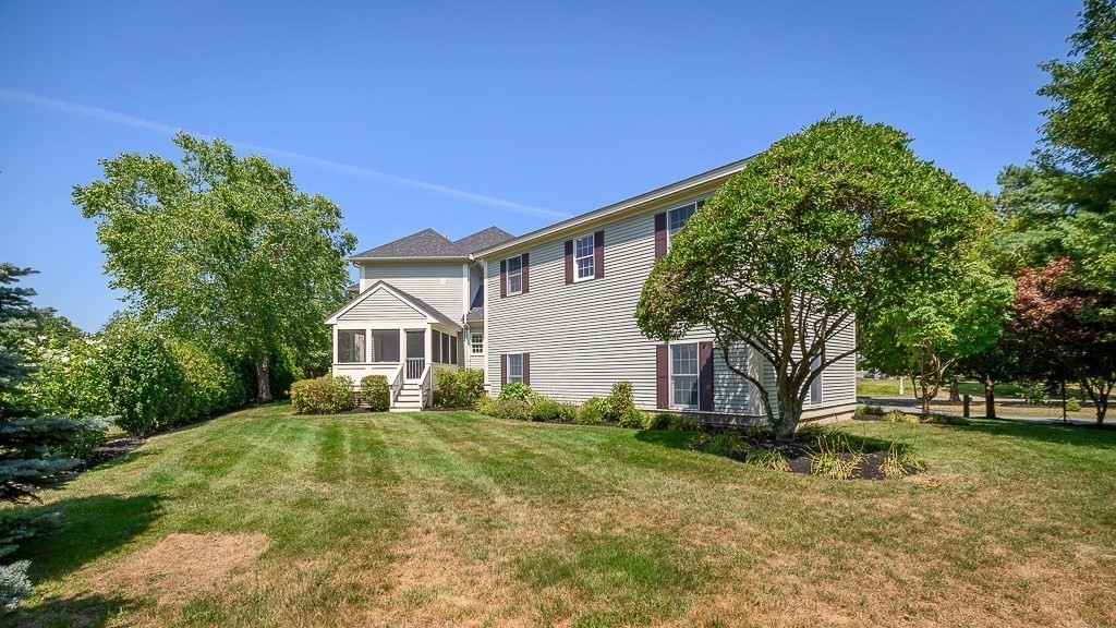 17 Patton Drive Hamilton, MA 01982 - Photo 3 of 37 a front view of a house with a yard