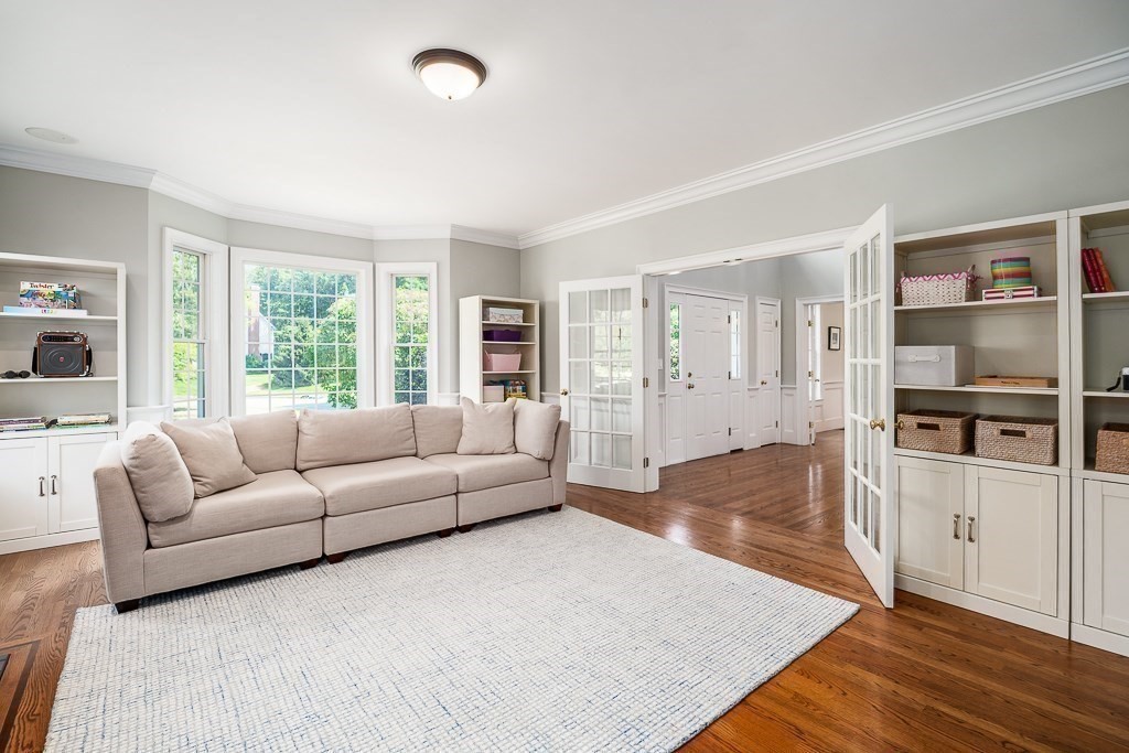 17 Patton Drive Hamilton, MA 01982 - Photo 7 of 37 a living room with furniture and a large window