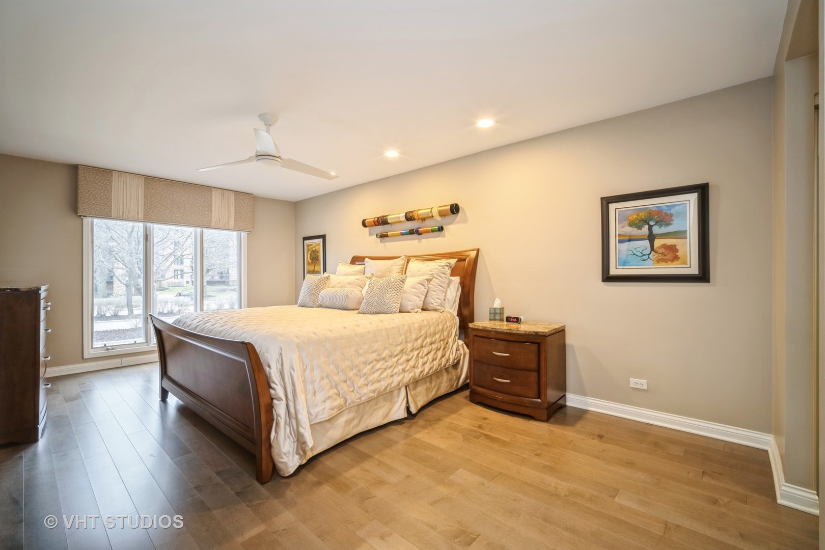 1831 Mission Hills Road, Unit 112 Northbrook, IL 60062 - Photo 14 of 17 a spacious bedroom with a bed and window