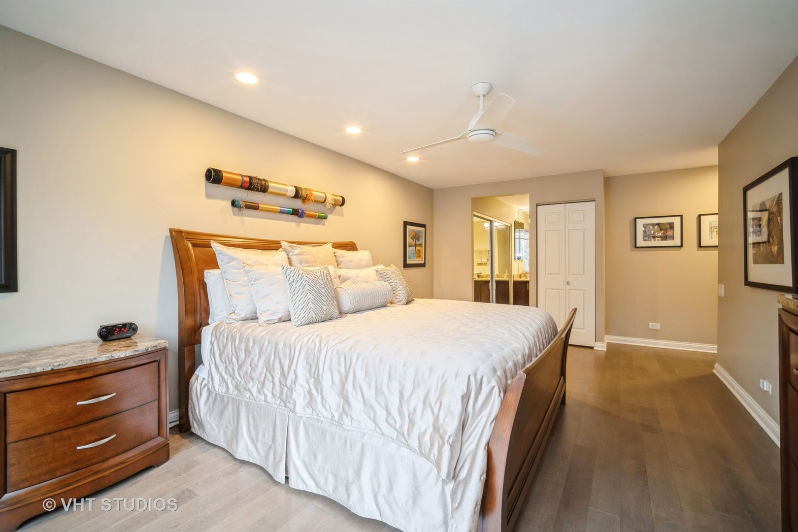 1831 Mission Hills Road, Unit 112 Northbrook, IL 60062 - Photo 15 of 17 a spacious bedroom with a bed and a dresser