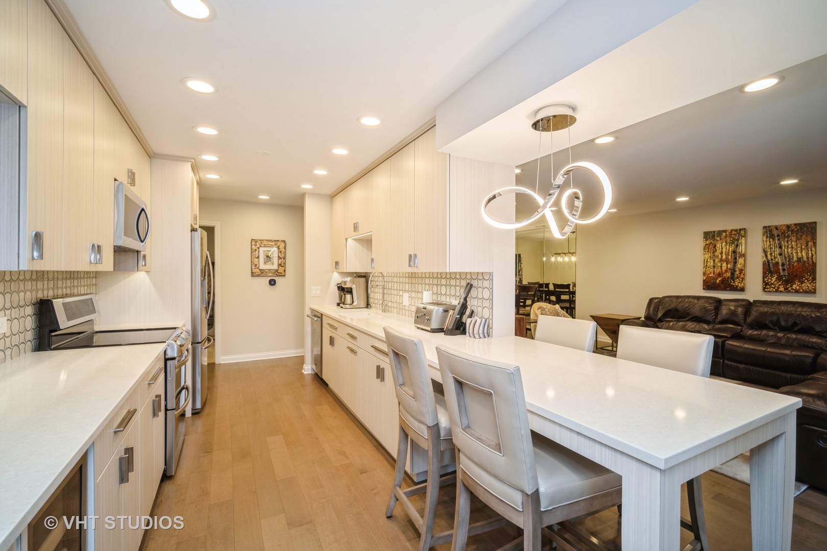 1831 Mission Hills Road, Unit 112 Northbrook, IL 60062 - Photo 6 of 17 a large kitchen with a large window and stainless steel appliances