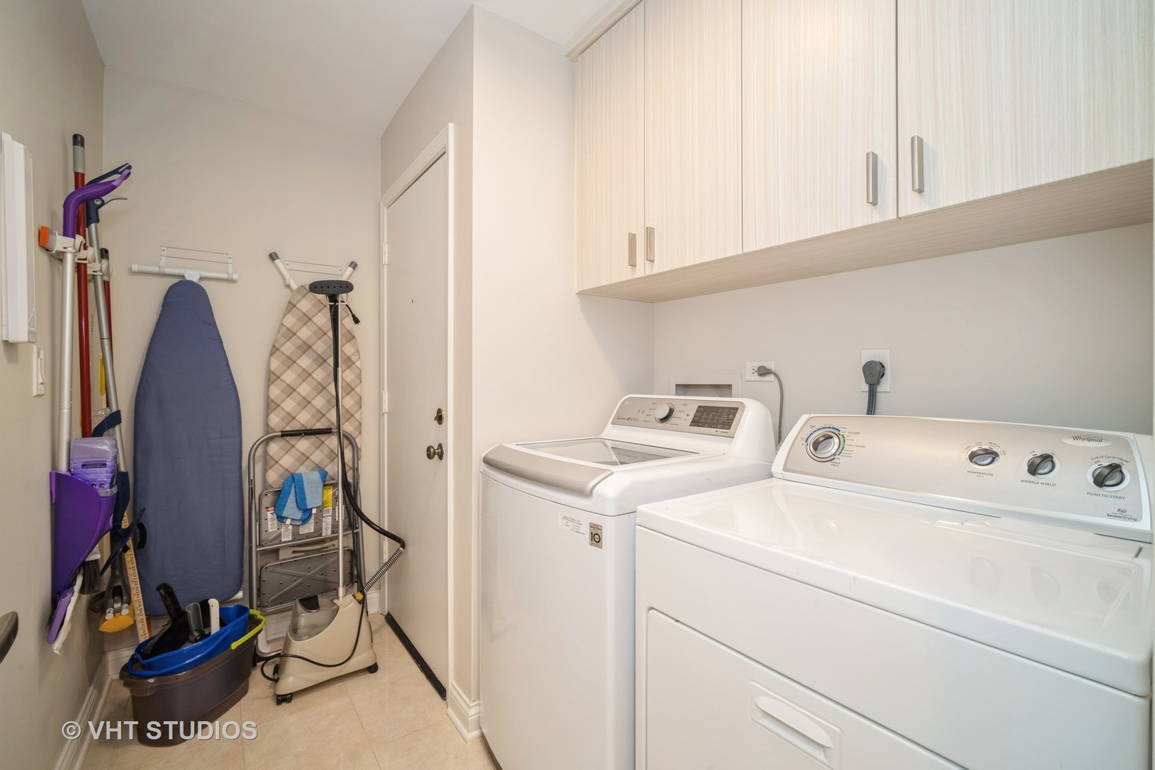 1831 Mission Hills Road, Unit 112 Northbrook, IL 60062 - Photo 10 of 17 a view of storage and utility room with washer and dryer
