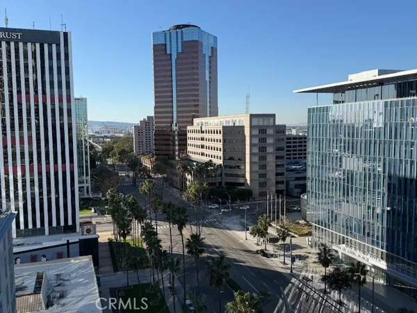 a view of a city with tall buildings