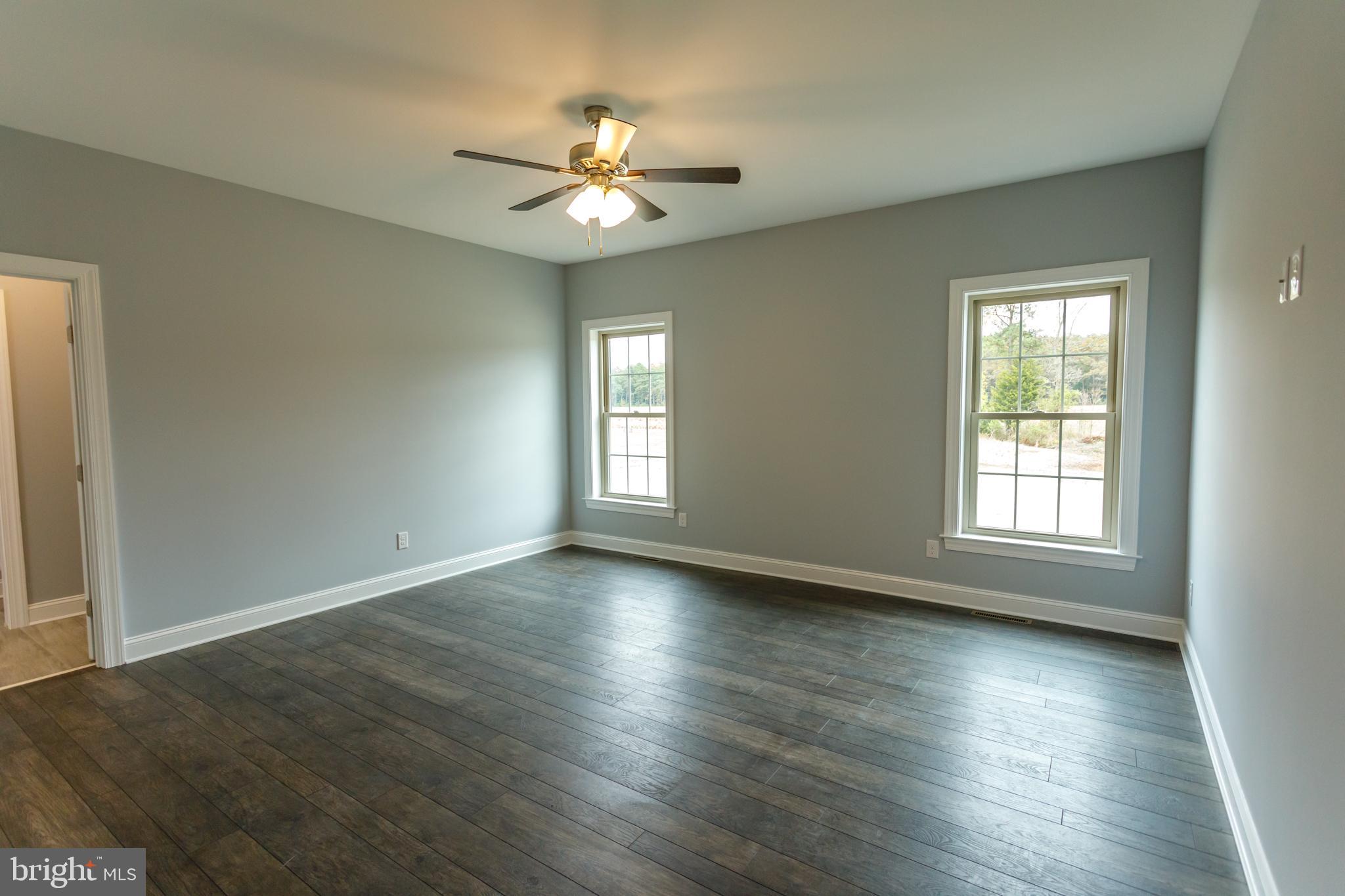 20695 State Forest Road Georgetown, DE 19947 - Photo 36 of 60 Master bedroom has laminate hardwood