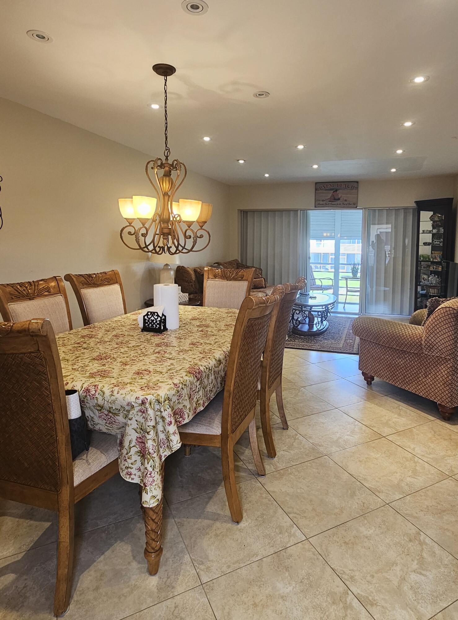 504 Davis Road, Unit 96 Palm Springs, FL 33461 - Photo 11 of 42 a view of a dining room with furniture