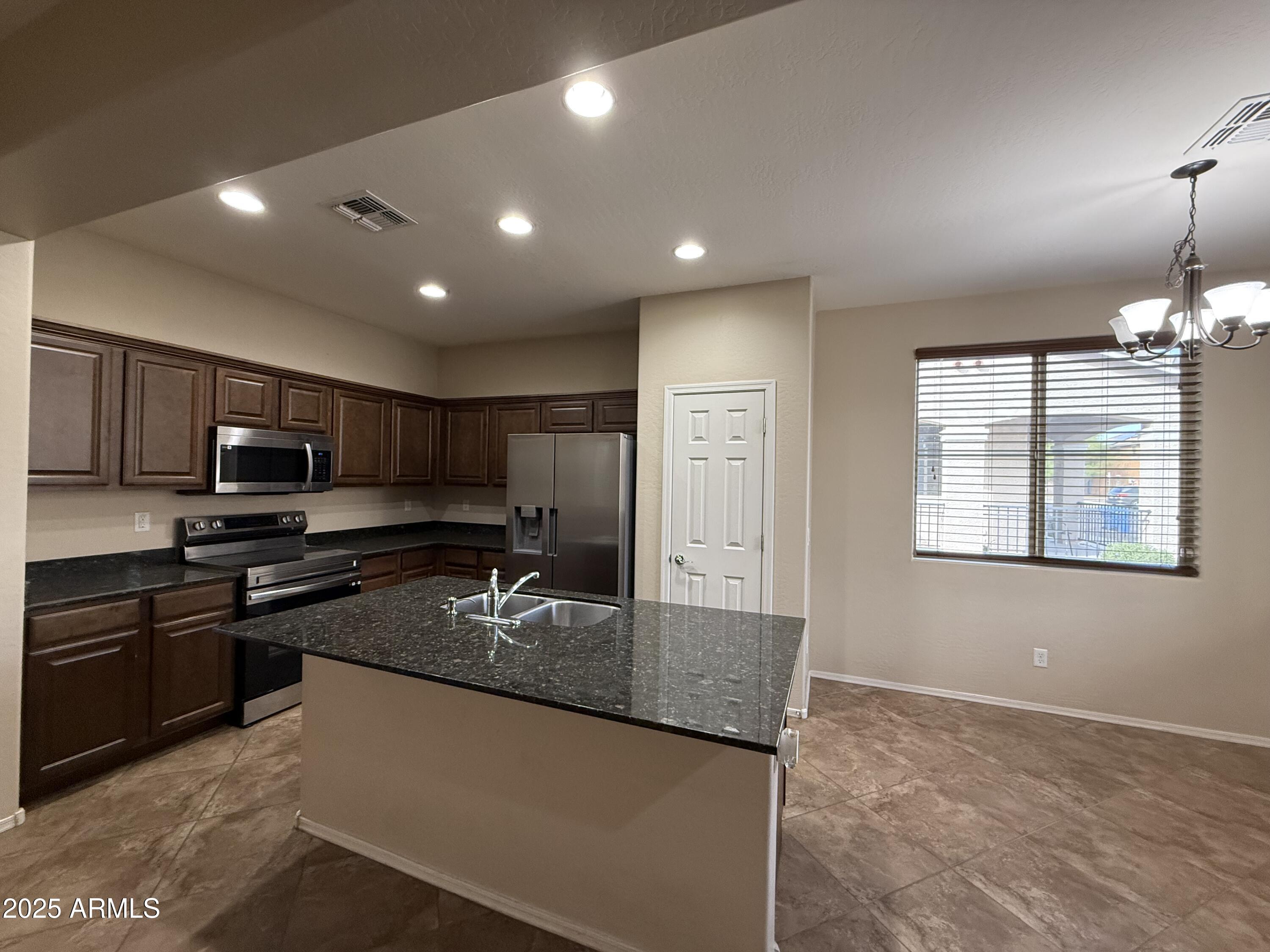 2646 North 73rd Drive Phoenix, AZ 85035 - Photo 5 of 24 IMG_1921