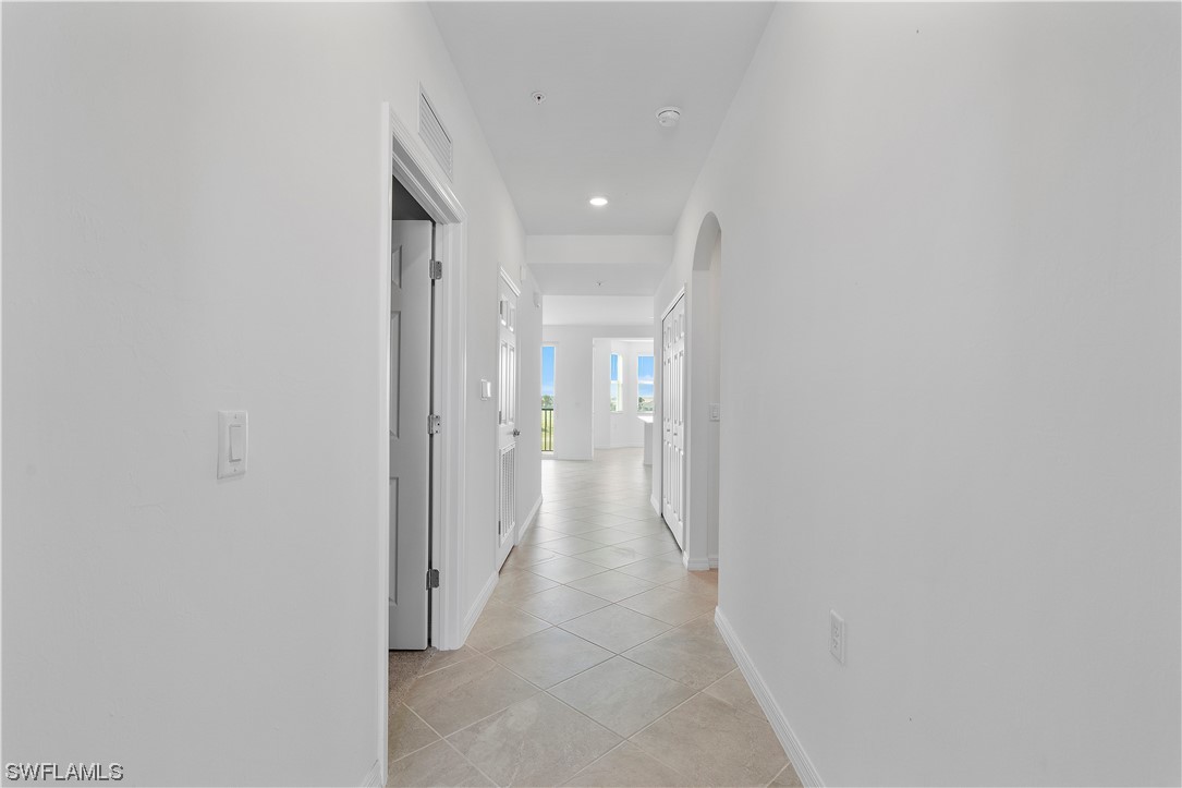 43989 Boardwalk Loop, Unit 2033 Punta Gorda, FL 33982 - Photo 20 of 36 a view of a hallway