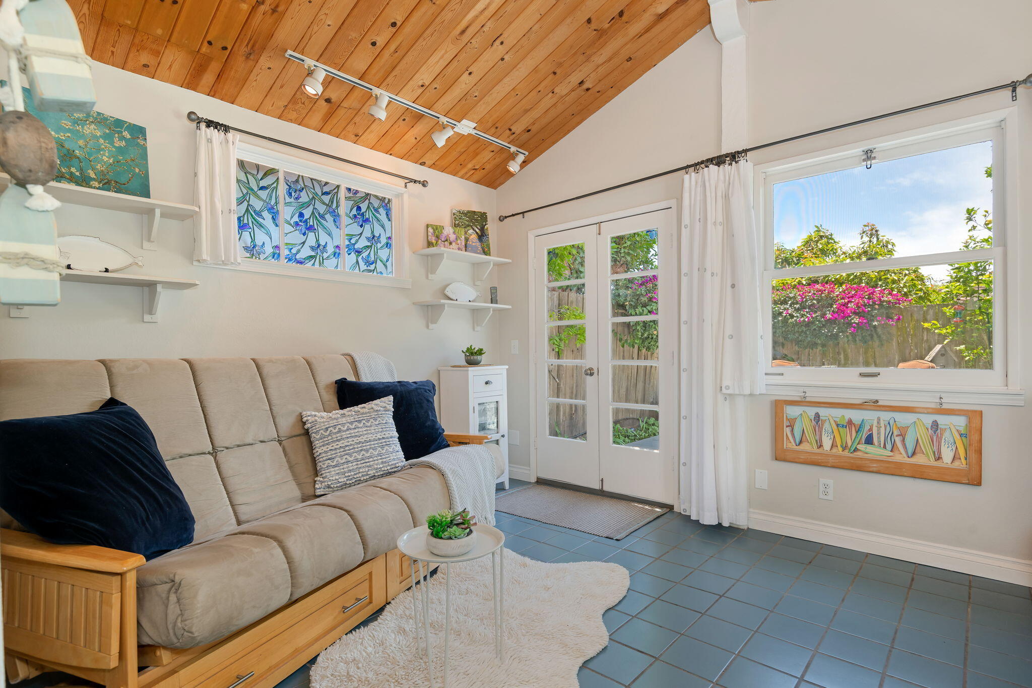 2129 Red Rose Way Santa Barbara, CA 93109 - Photo 37 of 44 a living room with furniture and a painting on the wall