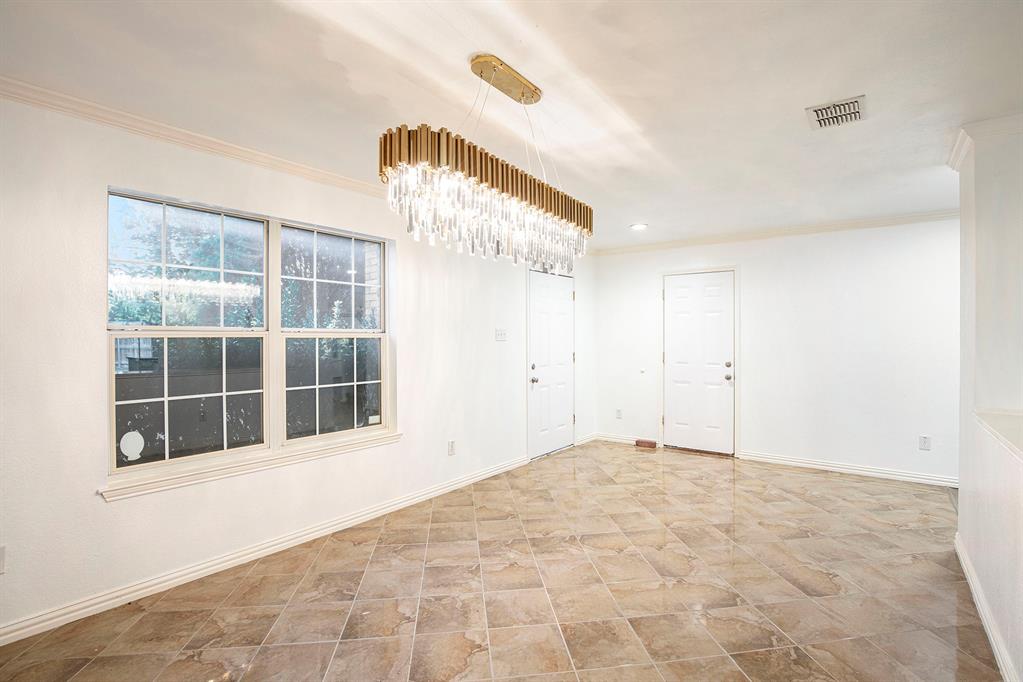 4800 Sleepy Ridge Circle Fort Worth, TX 76133 - Photo 9 of 40 a view of empty room with windows