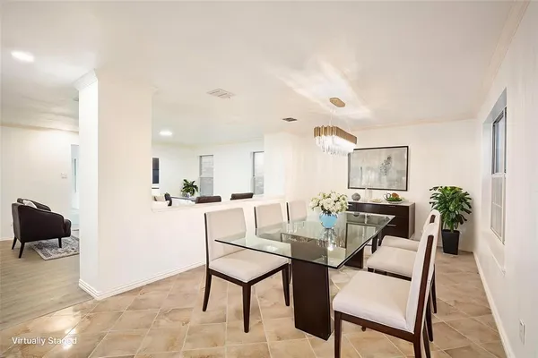 a view of a dining room with furniture
